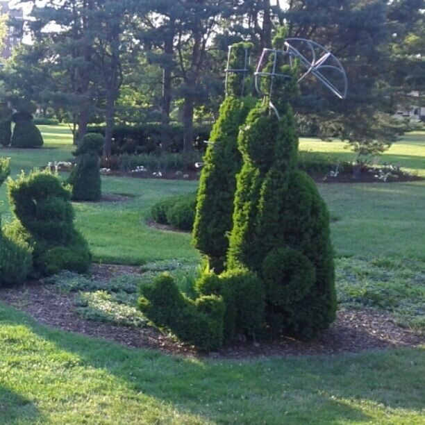 A topiary Taxus version of the Seurat's "A Sunday Afternoon on the Ile  De La Grande Jatte."