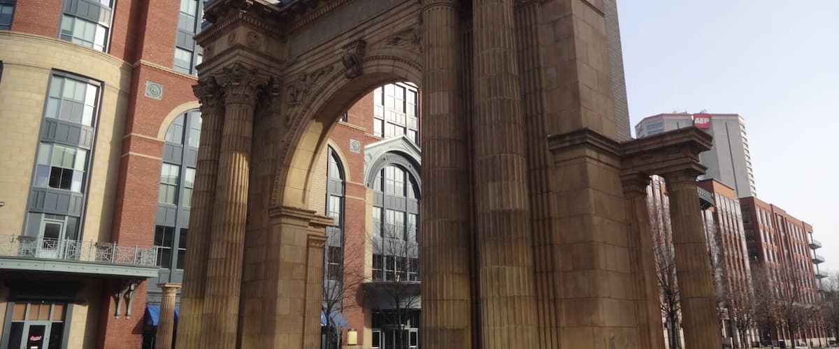 This arch is all that remains of Columbus Grand Union Station, the city's third and final train station.
Built in 1897 and designed by Daniel H. Burnham and Company of Chicago, the train station was located in the current footprint of the Greater Columbus Convention Center.
On October 22, 1976, demolition began despite having been listed on the National Register of Historic Places two years earlier. A restraining order federal judge George Smith halted demolition, but it was too late and only one arch of the ornate structure was saved.
In 1999, the arch in its entirety was slowing inched over several blocks to its current location at Dimon McPherson Commons in the Arena District.
#architecture
