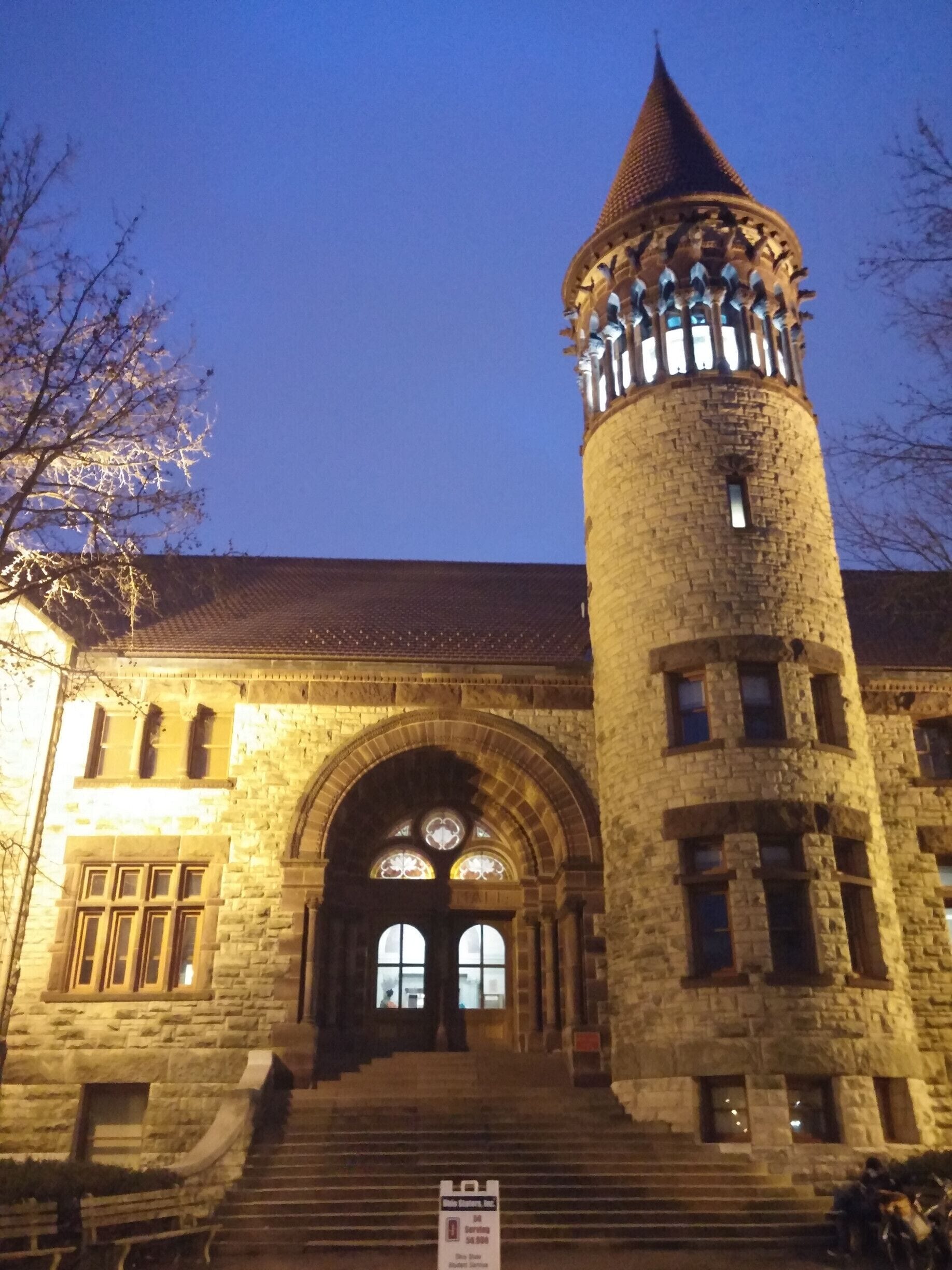 The second oldest building remaining on The Ohio State University campus, Orton Hall was opened in 1893. It is named after Dr Edward Orton, Sr. who served as Ohio State's first president, OSU Professor of Geology from 1873 to 1899, and Ohio's State Geologist from 1882 until his death in 1899.
Orton Hall is built of 40 different Ohio building stones. In the outside walls, these stones are laid in stratigraphic order according to their relative positions in Ohio's bedrock. The only non-indigenous to Ohio stone used is Indiana Limestone to build the front steps. It was chosen because of its high concentration of embedded fossils.
The bell tower was dedicated in 1915 and contains 25,000 pounds of bells that can be heard regularly tolling across campus. Encircling the top of the tower are 24 columns with gargoyle-like figures which are restorations of fossil animals.