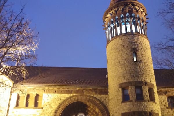 The second oldest building remaining on The Ohio State University campus, Orton Hall was opened in 1893. It is named after Dr Edward Orton, Sr. who served as Ohio State's first president, OSU Professor of Geology from 1873 to 1899, and Ohio's State Geologist from 1882 until his death in 1899.
Orton Hall is built of 40 different Ohio building stones. In the outside walls, these stones are laid in stratigraphic order according to their relative positions in Ohio's bedrock. The only non-indigenous to Ohio stone used is Indiana Limestone to build the front steps. It was chosen because of its high concentration of embedded fossils.
The bell tower was dedicated in 1915 and contains 25,000 pounds of bells that can be heard regularly tolling across campus. Encircling the top of the tower are 24 columns with gargoyle-like figures which are restorations of fossil animals.