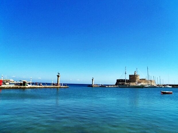 Mandraki harbor, Rhodes, Greece
It is a beautiful harbor!