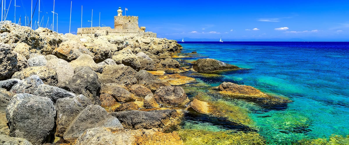 Saint Agios Nikolaos fortress, port Mandraki at Rhodes island in Greece
