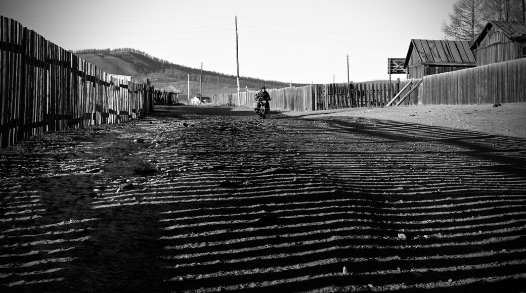 A biker on his way to the Lake. The Lake was frozen solid . Temperatures of -30C in the day to - 40C at night