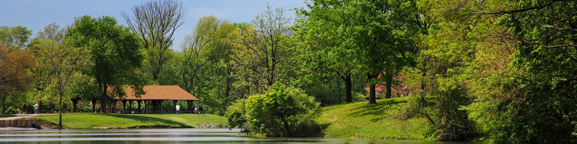 A Fishing Lake And Picnic Pavilion During Spring At The Corwin M Nixon Pine Hill Lakes Park, Mason Ohio, USA
