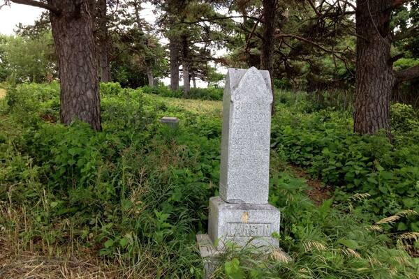 Century old pioneer Cemetary near Loon Lake. Urban legends tell of a witch's grave at this site. Those who trespass on it are said to be cursed for life.