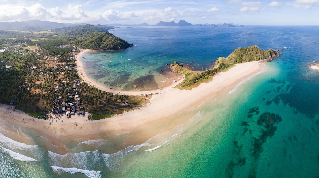 Aerial panoramic view of Nacpan beach and ocean, El Nido, Palawan, Philippines