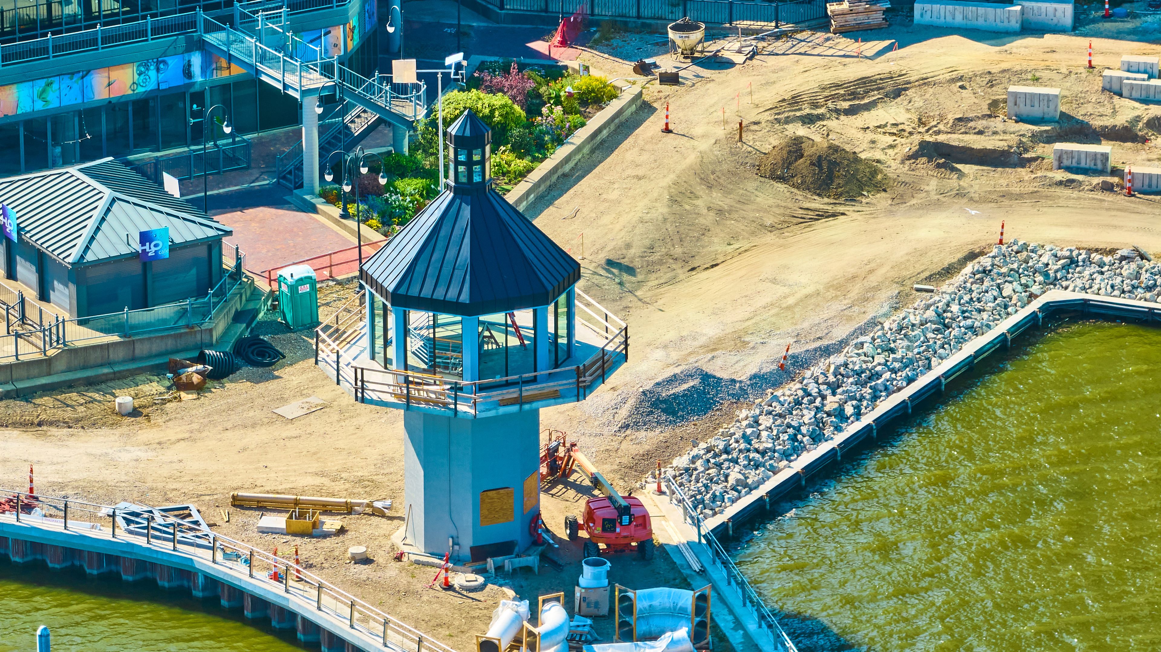 Aerial View of Waterfront Construction with Lighthouse and Murals in Toledo