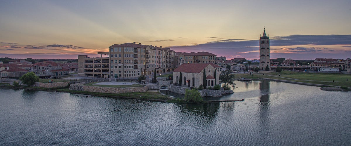 Aerial Sunset Over Adriatica Village and Lake, McKinney, Texas