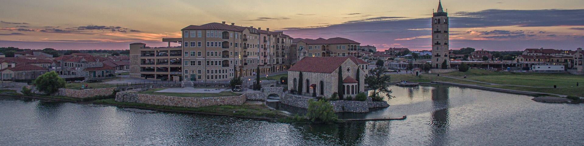 Aerial Sunset Over Adriatica Village and Lake, McKinney, Texas