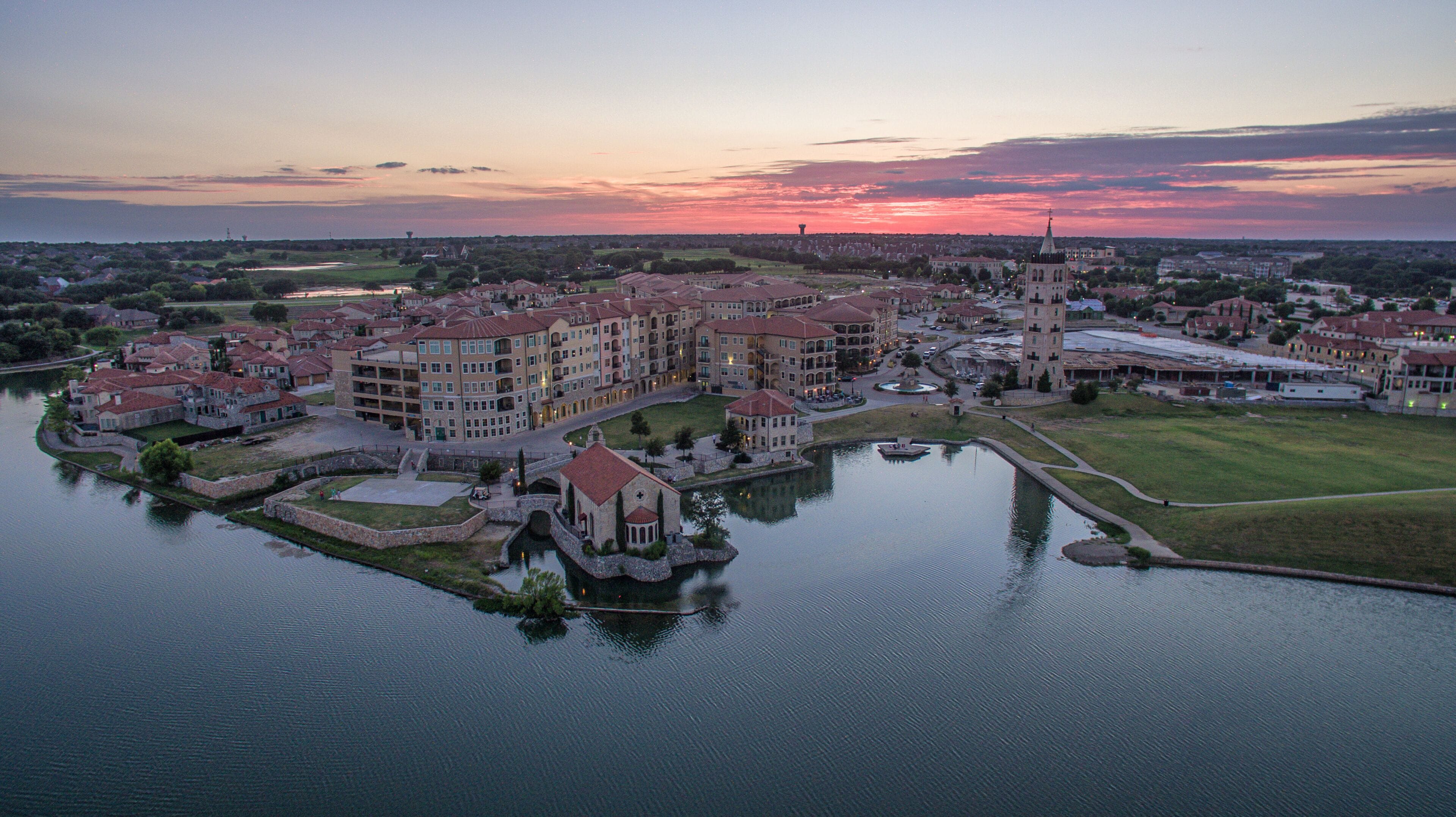 Aerial Sunset Over Adriatica Village and Lake, McKinney, Texas