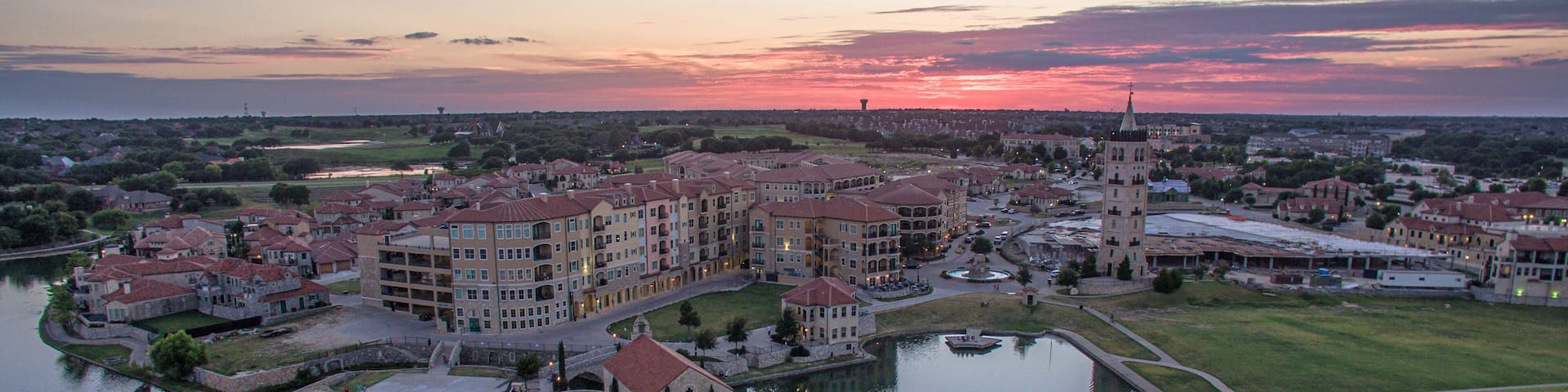 Aerial Sunset Over Adriatica Village and Lake, McKinney, Texas