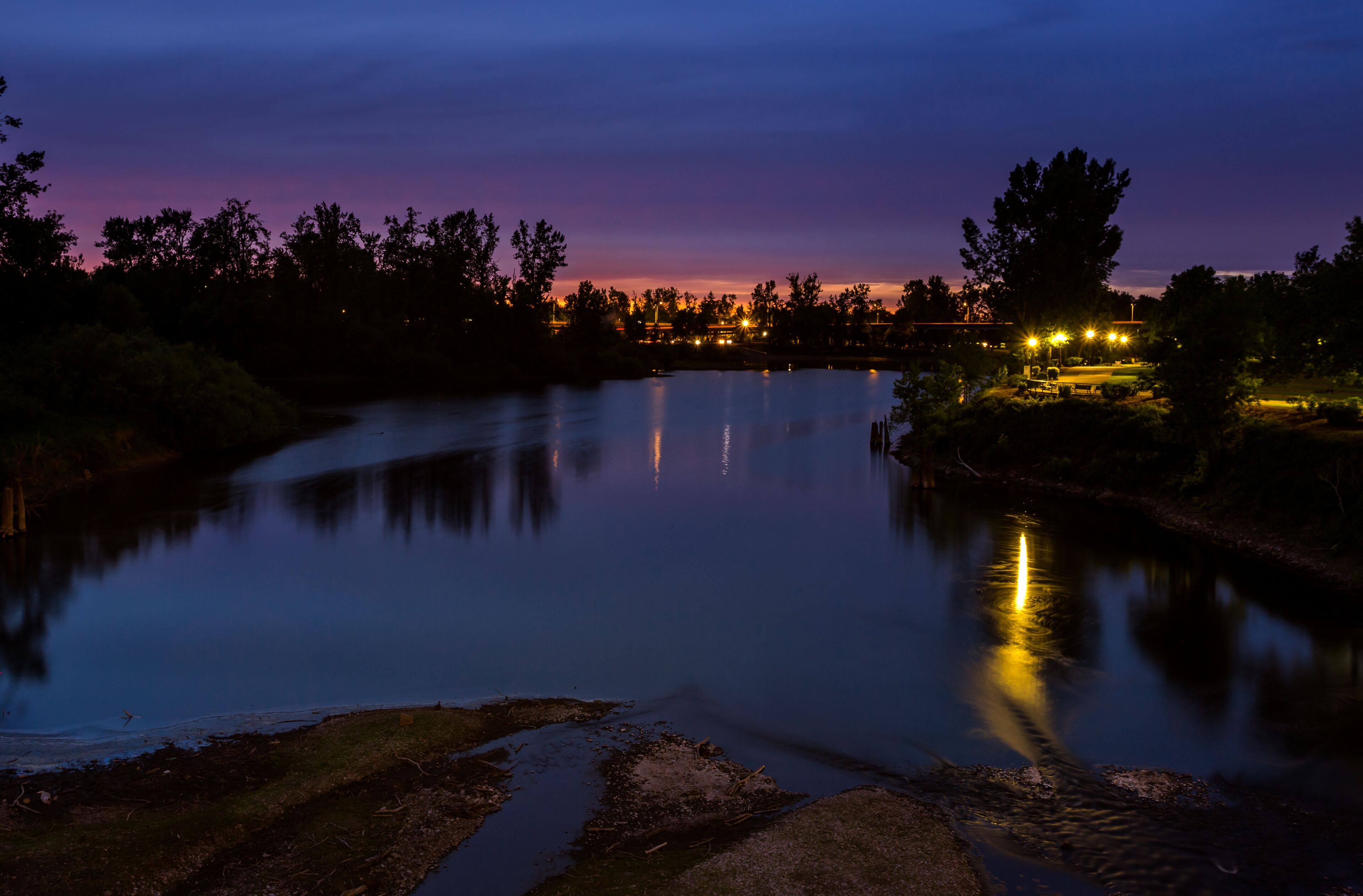 Beautiful  after-sunset reflection over the river. Willamette river in Oregon, USA