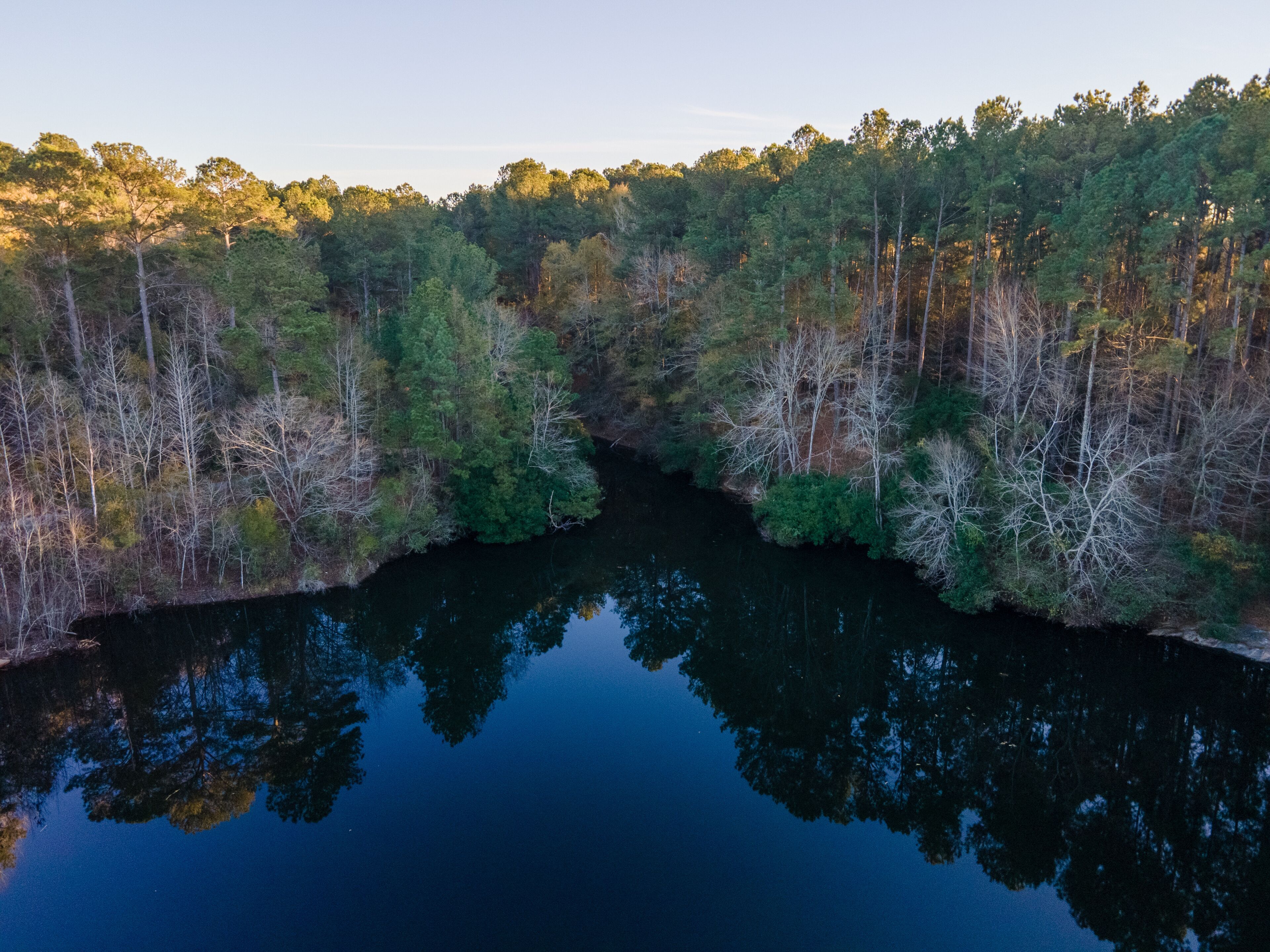 Aerial landscape of pond at Euchee Creek Greenway Trail during Fall in Grovetown Augusta Georgia