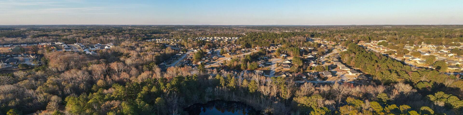 Aerial landscape of pond at Euchee Creek Greenway Trail during Fall in Grovetown Augusta Georgia