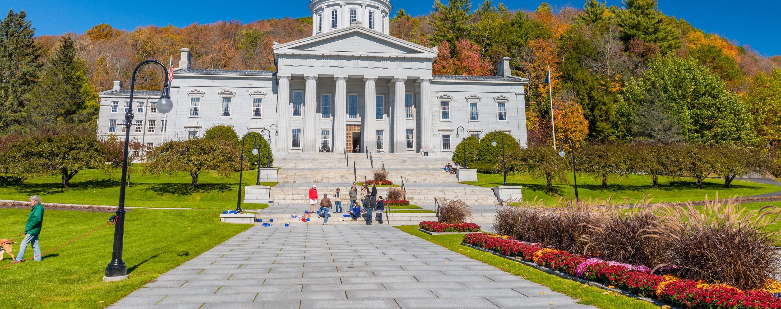 MONTPELIER, VT - OCTOBER 10, 2015: Vermont State House in Autumn season with tourists