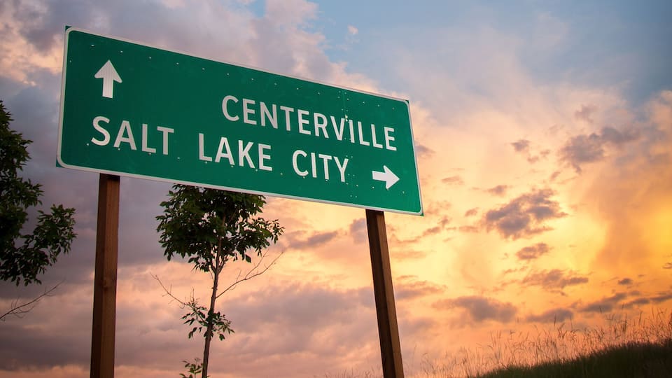 A road sign with directions to Centerville and Salt Lake City.