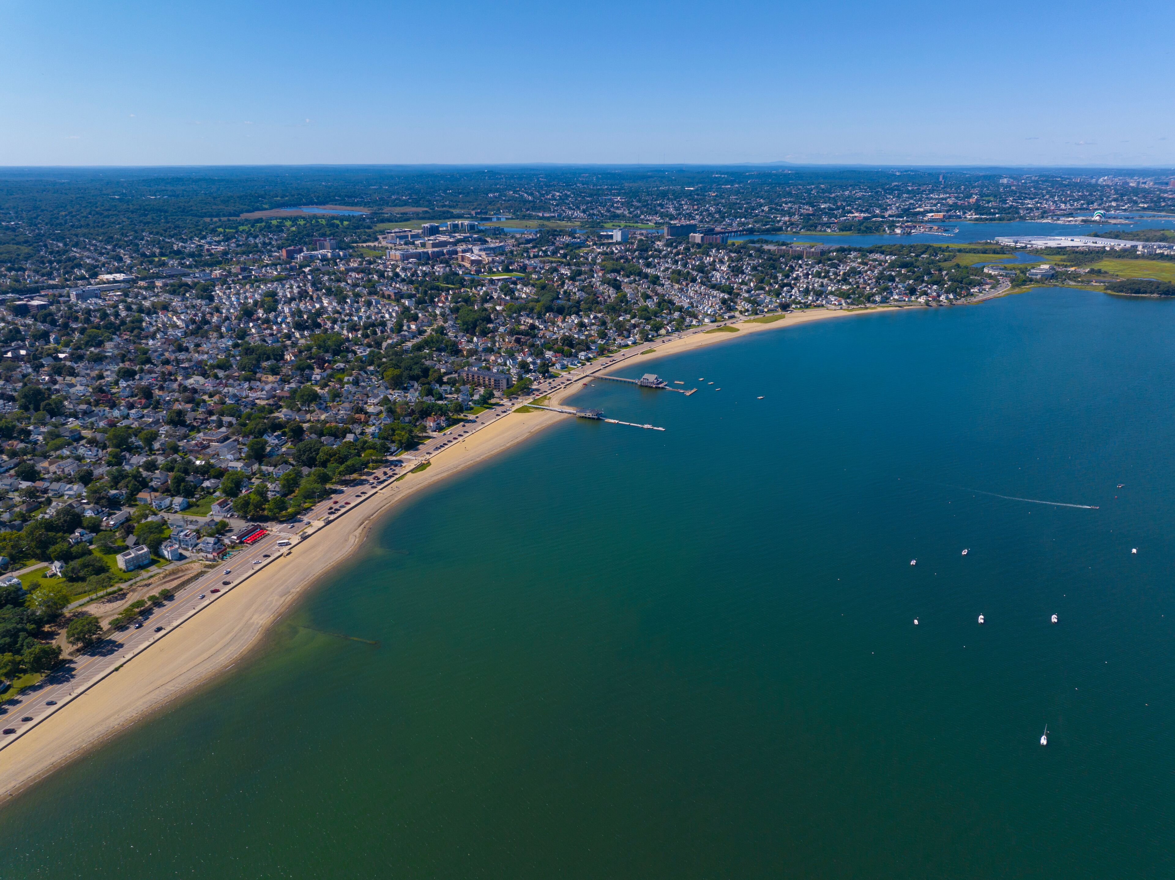 Wollaston Beach aerial view and Quincy Shore Drive with Squantum and Wollaston Yacht Club in Wollaston, city of Quincy, Massachusetts MA, USA. 