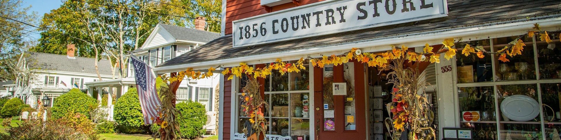 A red building with a sign reading "1856 Country Store".