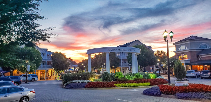 Downtown Smyrna Georgia. Downtown Smyrna Georgia taken at sunset from the street. Shopping and restaurants within an idyllic setting of flowers