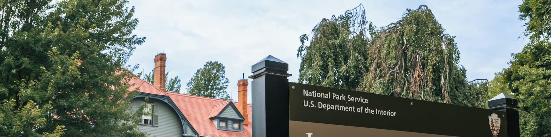 A historic house with a sign indicating it is the James A. Garfield National Historic Site.