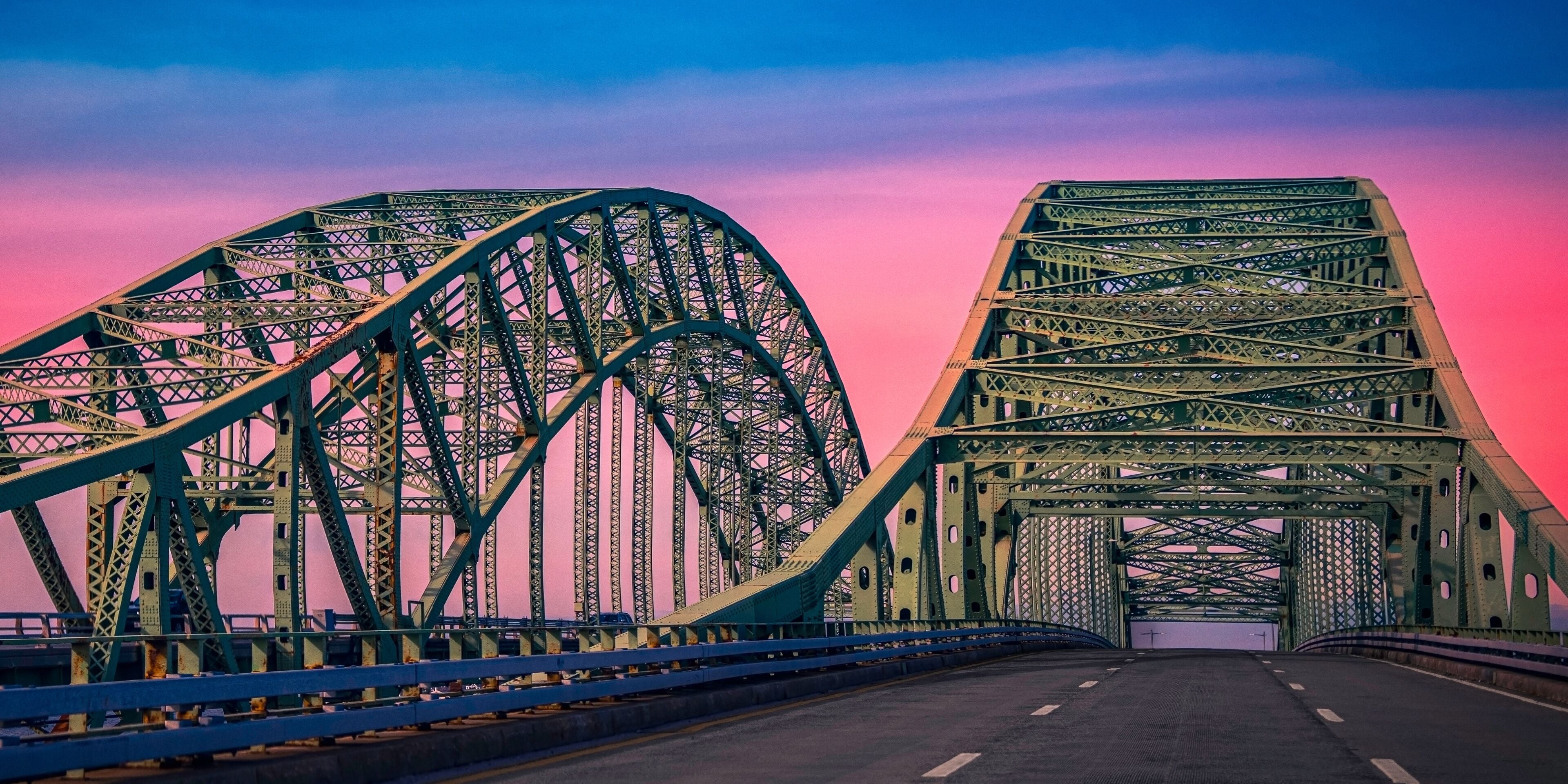 Great South Bay Bridge, aka the Captree Bridge, a twin-span bridge on the southwest side of Suffolk County, New York, on Long Island over the Great South Bay at Sunset
