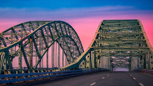 Great South Bay Bridge, aka the Captree Bridge, a twin-span bridge on the southwest side of Suffolk County, New York, on Long Island over the Great South Bay at Sunset