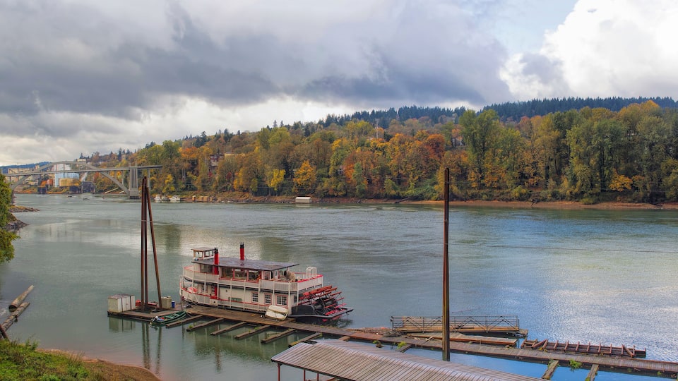 Historic Sternwheeler Docked Along Willamette River in Fall