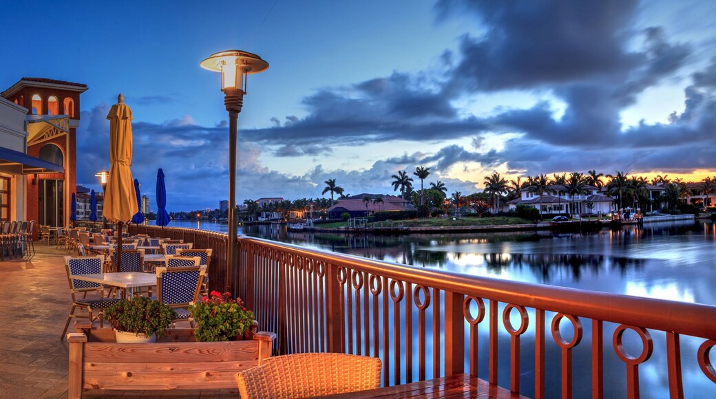 Outdoor dining at the Village at Venetian Bay at sunrise in Naples