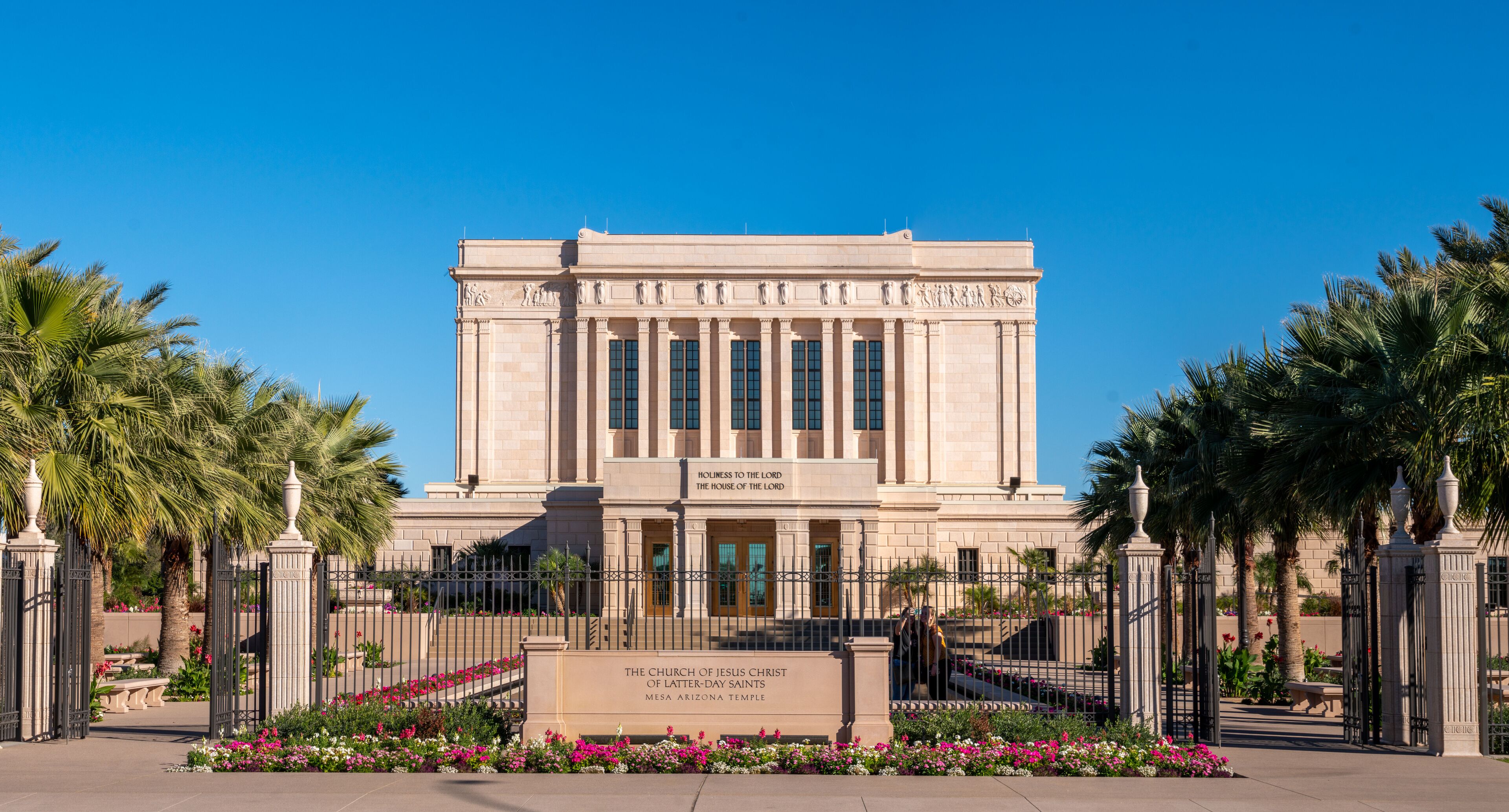 The Church of Jesus Christ of Latter-day Saints Mesa Arizona Temple with a clear blue sky.