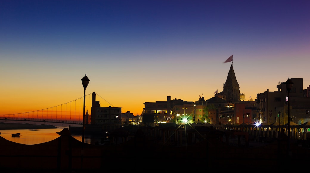 View of Gomti river and Krishna Temple Shree Dwarkadhish at night. Dwarka, Gujarat, India