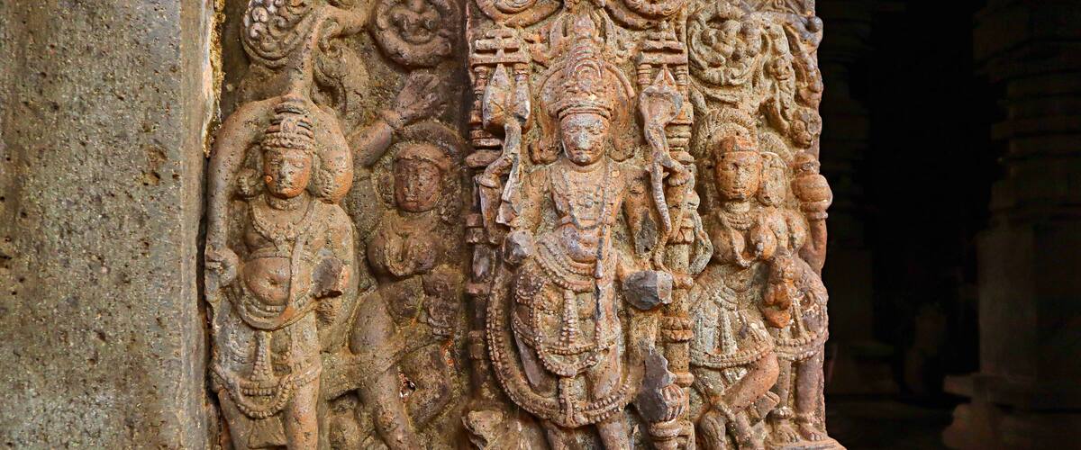 Carved sculptures of the doorkeepers at Shri Karneshwar Temple, Sangameshwar, Ratnagiri, Maharashtra, India.