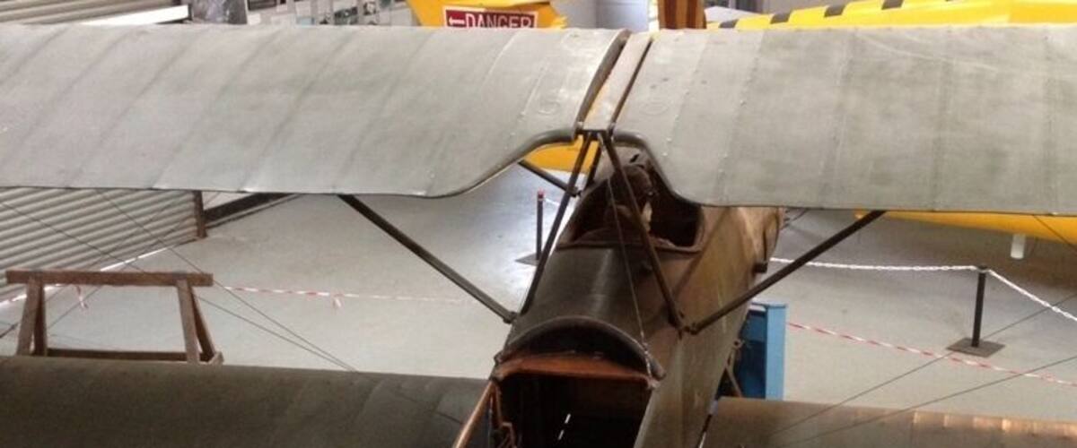 An aircraft with a distinctive nose cone and circular emblem.