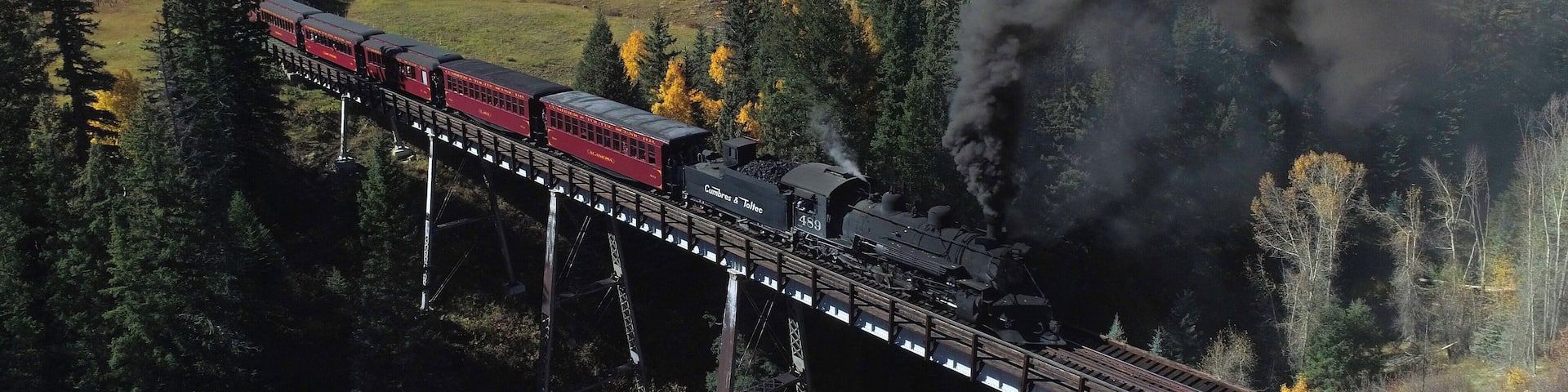 The Cumbres & Toltec is a 3 ft narrow-gauge scenic railroad running for 64 miles between Antonito, Colorado and Chama, New Mexico. Fall scenic tours book fast, plan ahead if you want to catch a ride! #ADVENTURE