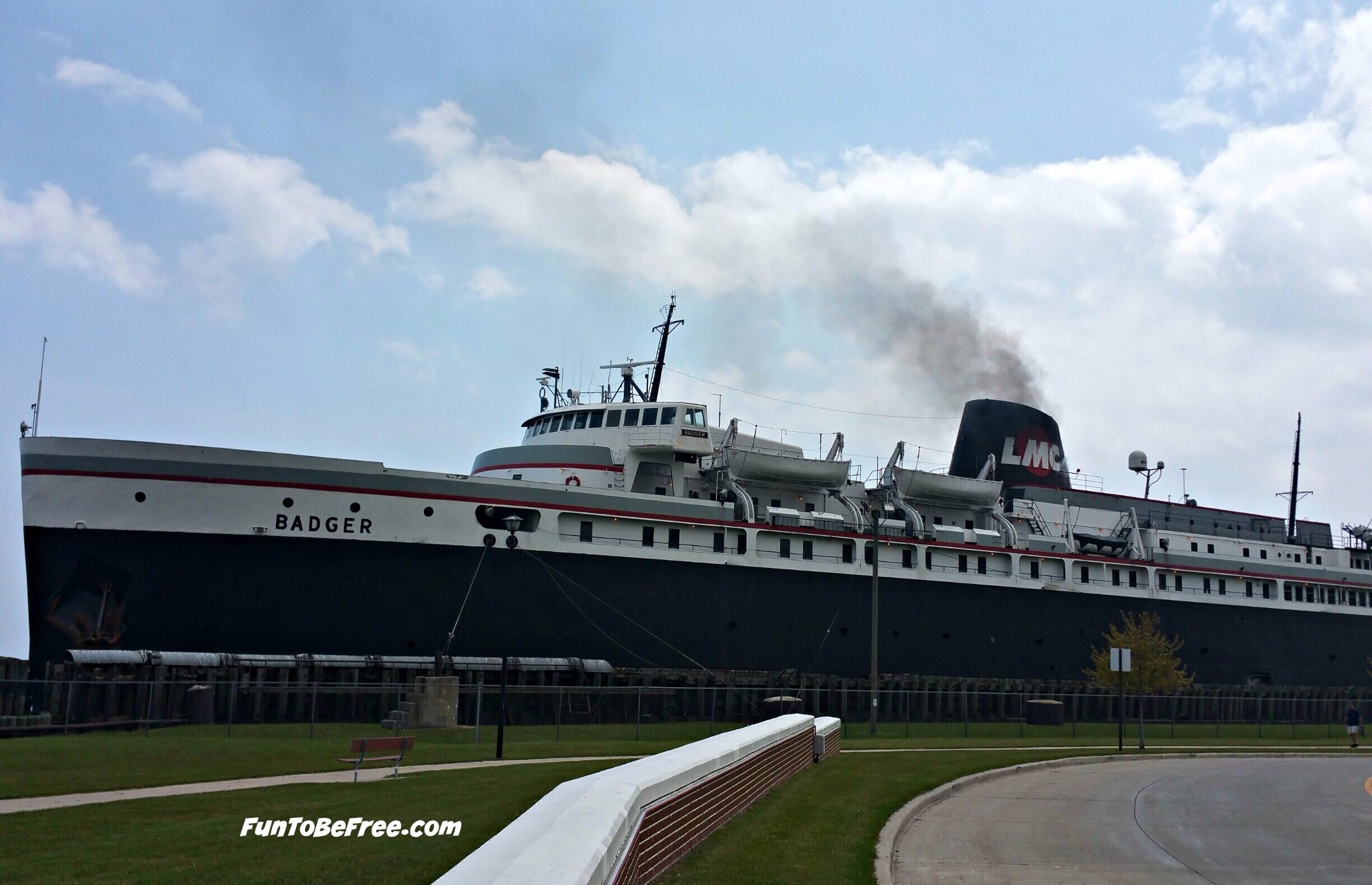 Looking at driving to MI from WI or Vis Versa take the S.S. Badger across Lake Michigan.  You'll enjoy the relaxing ride.

The Badger was constructed as a rail car ferry in 1952–53 by the Christy Corporation of Sturgeon Bay, Wisconsin,[4] along with her twin the SS Spartan (named after the mascot of Michigan State University) with a reinforced hull for ice-breaking. It was originally used to carry railroad cars, passengers and automobiles between the two sides of the lake all year long. Today, the ferry connects the eastern and western segments of US 10 in the two cities from May to October.[5]

Launched September 6, 1952, the SS Badger entered service March 21, 1953, for the Chesapeake and Ohio Railway (from 1973 a subsidiary of the Chessie System). The C&O had acquired the rail car ferry operations in Ludington with its acquisition of the Pere Marquette Railway in 1947.[6] After 1972, service was gradually curtailed; all but the three newest vessels were retired, and sailings to Milwaukee, Wisconsin, and Manitowoc, Wisconsin, were discontinued, leaving only the route between Ludington and Kewaunee, Wisconsin. On July 1, 1983, the Chessie System ended its car ferry service when it sold the steamers Badger, Spartan, and City of Midland 41 to Glen F. Bowden of Ludington. He organized the Michigan–Wisconsin Transportation Company (MWT) to continue the operation.[7]

The railroad car ferry concept on Lake Michigan was facing serious economic troubles during the 1980s and by November 1988, the Badger was the only vessel running. It was the last of the 14 ferries since 1897 based in Ludington remaining in service.[4] On November 16, 1990, facing bankruptcy, Bowden laid up the Badger, ending 93 years of railway car ferry service out of Ludington and 98 years on Lake Michigan as a whole.  #History #CarFerry's #Adventure
