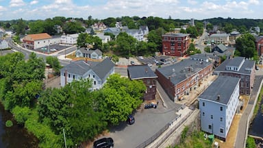 Methuen downtown including Spicket Mill at Spicket River aerial view at Pleasant Street and Broadway in historic city center of Methuen, Massachusetts MA, USA.