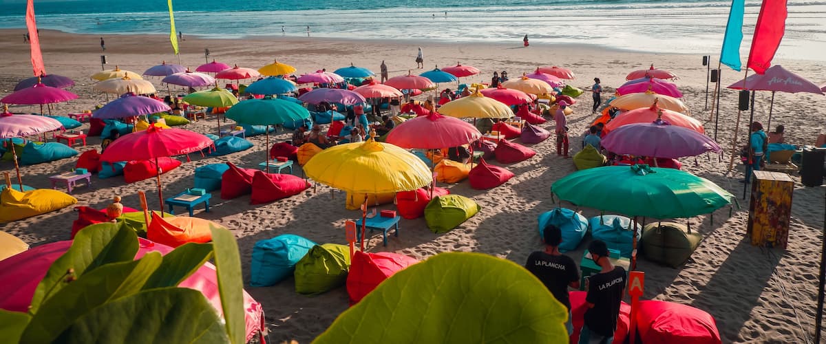 Beach Umbrellas View Of Double Six Beach, Seminyak, Bali, Indonesia.