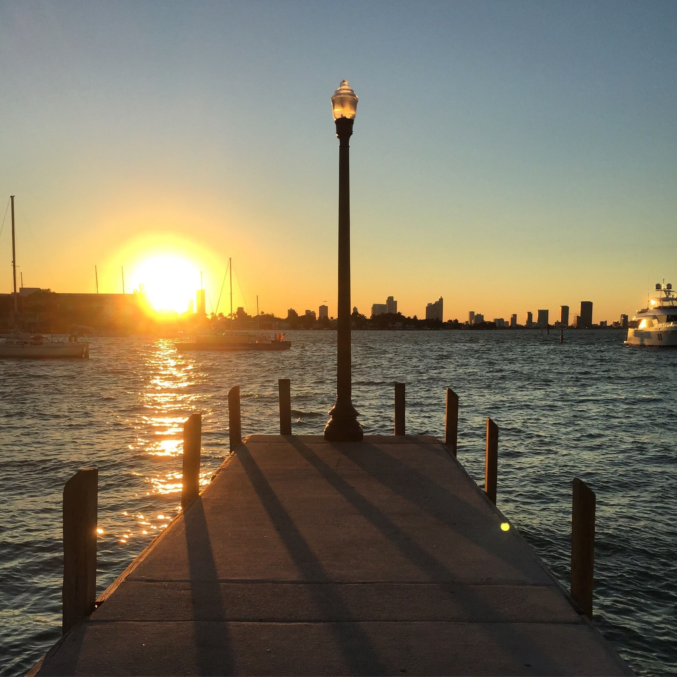 Sitting on the dock ... 🌇Enjoying the sunset!! What a great day!!🎁 #bikingaroundmiami🚲 #exploremore #adventureON #ruff