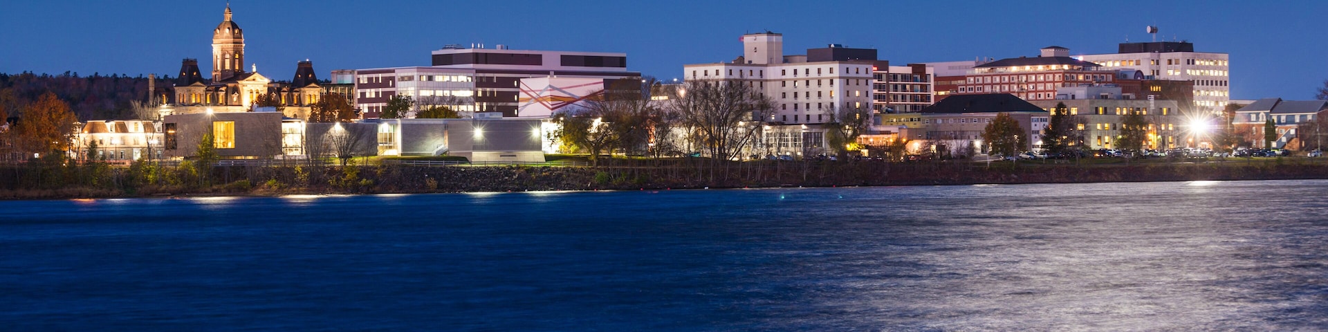 Canada, Central New Brunswick, Fredericton. City skyline from the Saint John River.