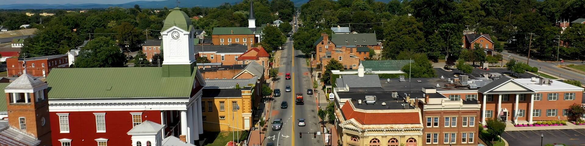 Low aerial view of main street usa, Charles Town, West Virginia, WV on a beautiful sunny day.