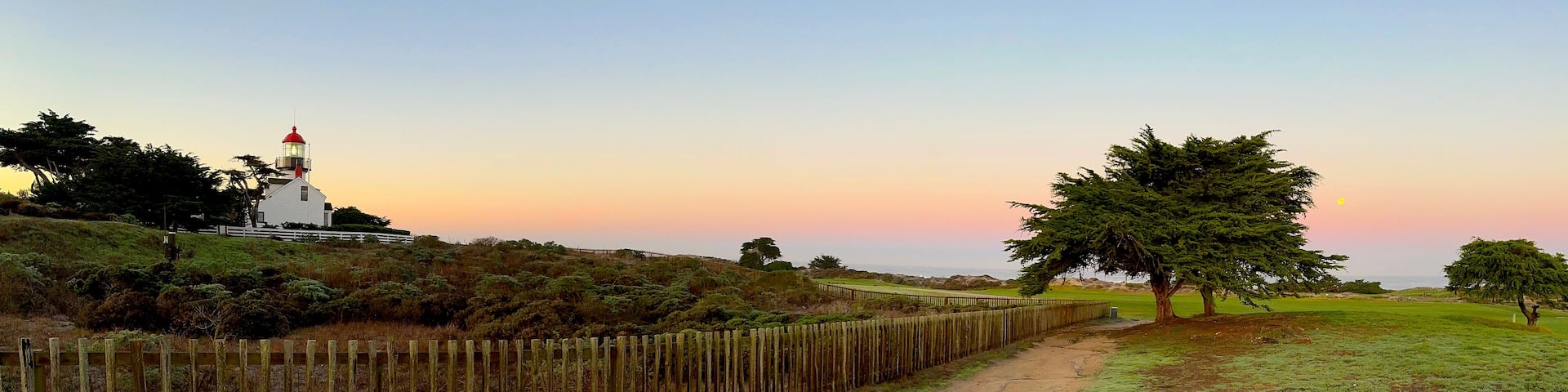 Lighthouse Trail at Twilight with Full Moon and Cypress Tree, Pacific Grove Golf Links on the Right, Monterey Bay, California. Point Pinos Lighthouse.