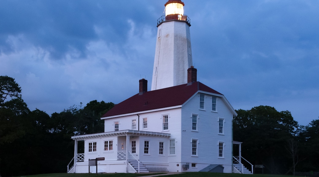 Sandy Hook Lighthouse is seen during twilight in August of 2024