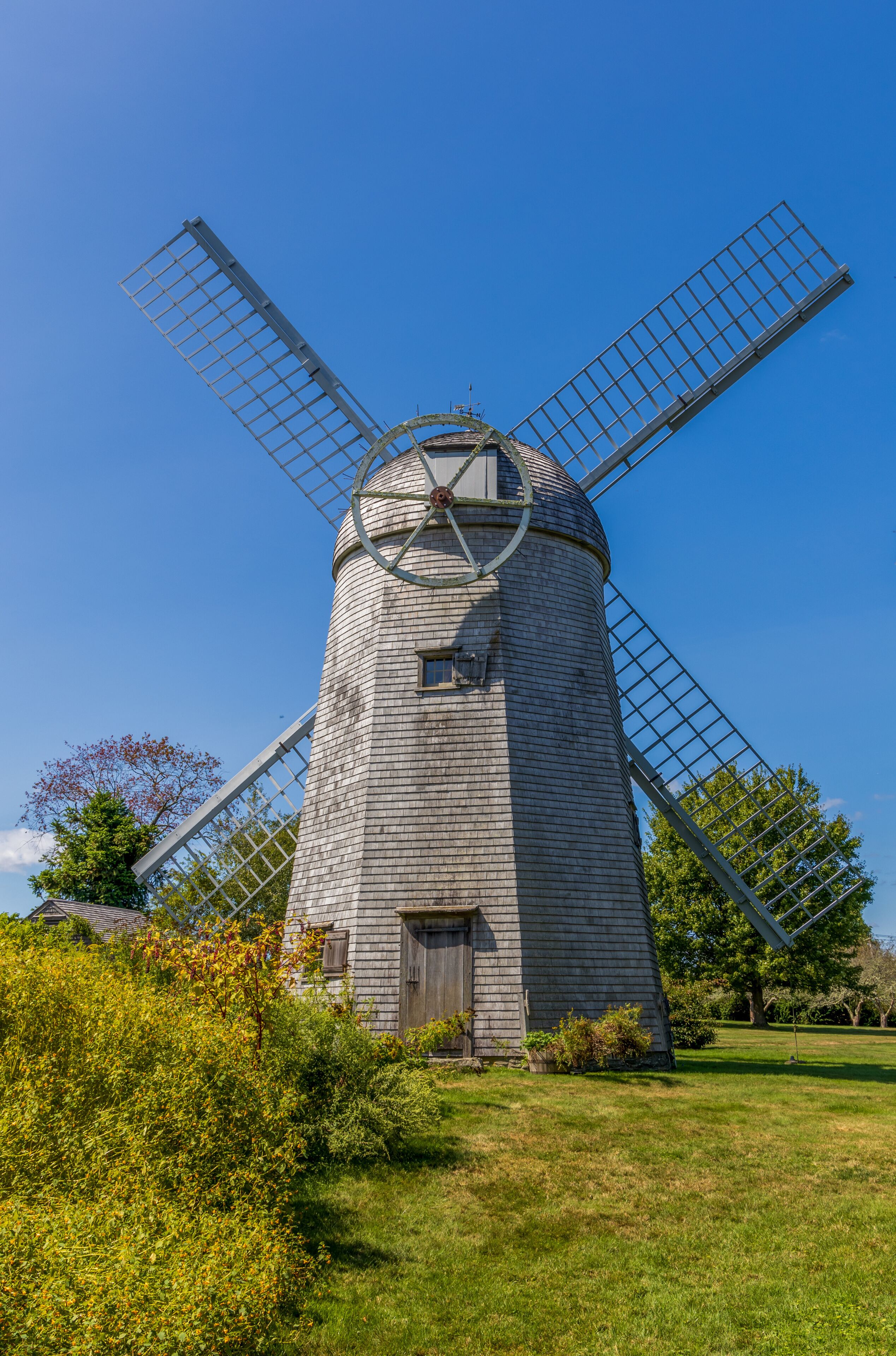 Shingled smock windmill at the Prescott Farm historic site in Middletown, Rhode Island