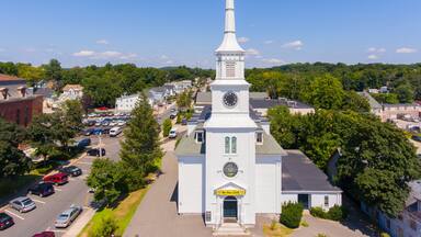 Unitarian Church Marlborough and Town Hall aerial view on Main Street in town center of Hudson, Massachusetts MA, USA.