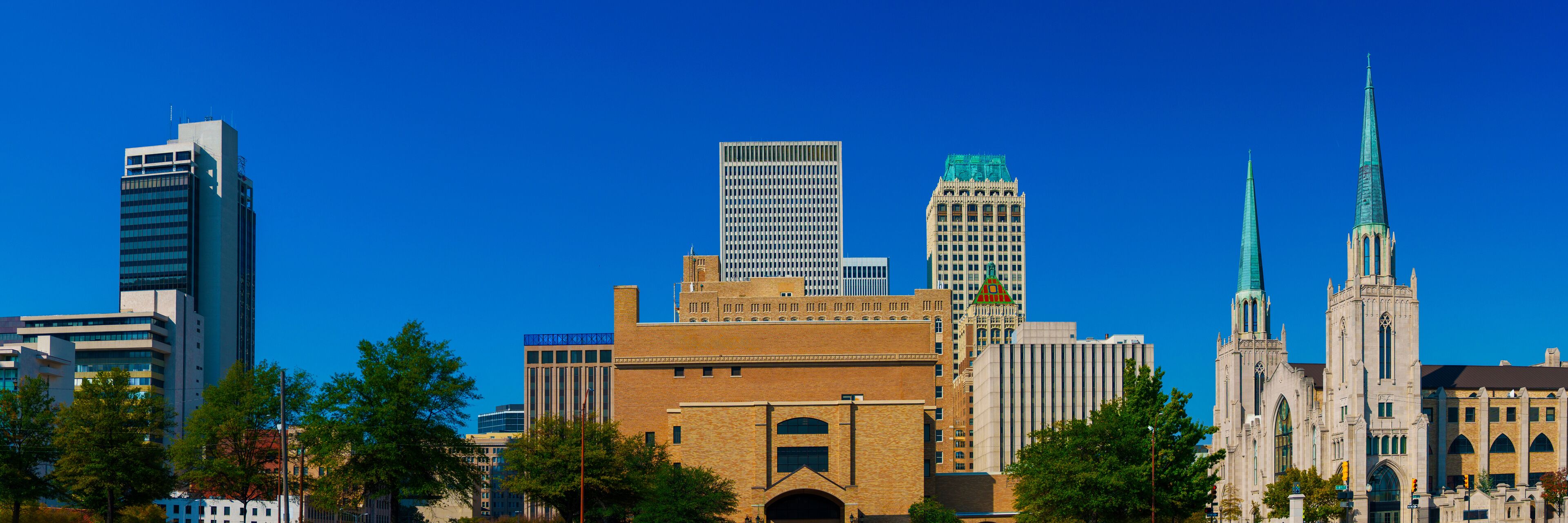 Tulsa City Skyline and autumn landscape in the State of Oklahoma, modern buildings and churches in the metropolis of the midwestern United States