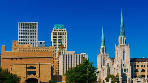 Tulsa City Skyline and autumn landscape in the State of Oklahoma, modern buildings and churches in the metropolis of the midwestern United States