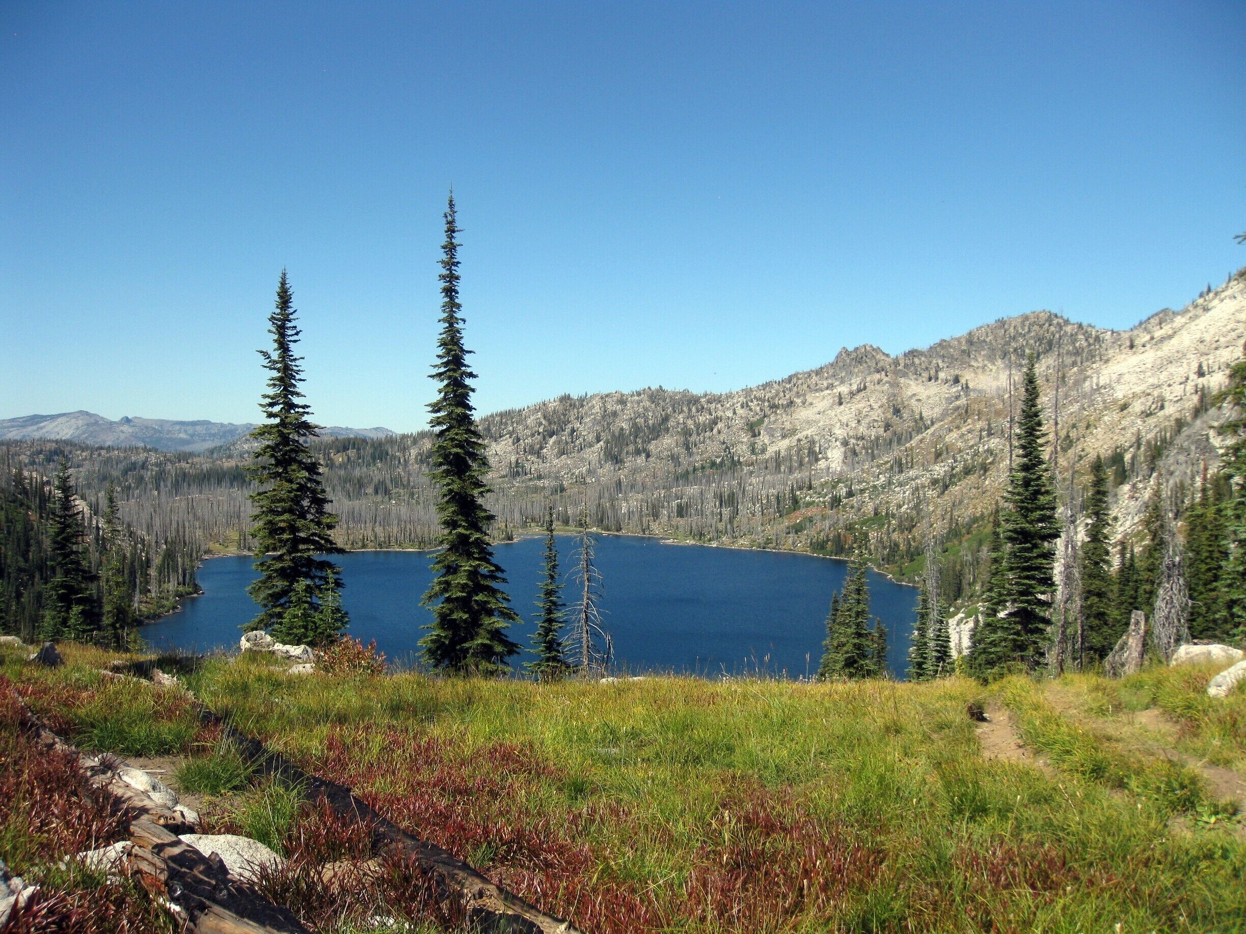 This lake is about a 3.5 to 4 mile hike and with a good elevation gain of about 1600 feet.   We were there during a full moon and it was just beautiful.  The best  campsites are the ones that you first come to.  