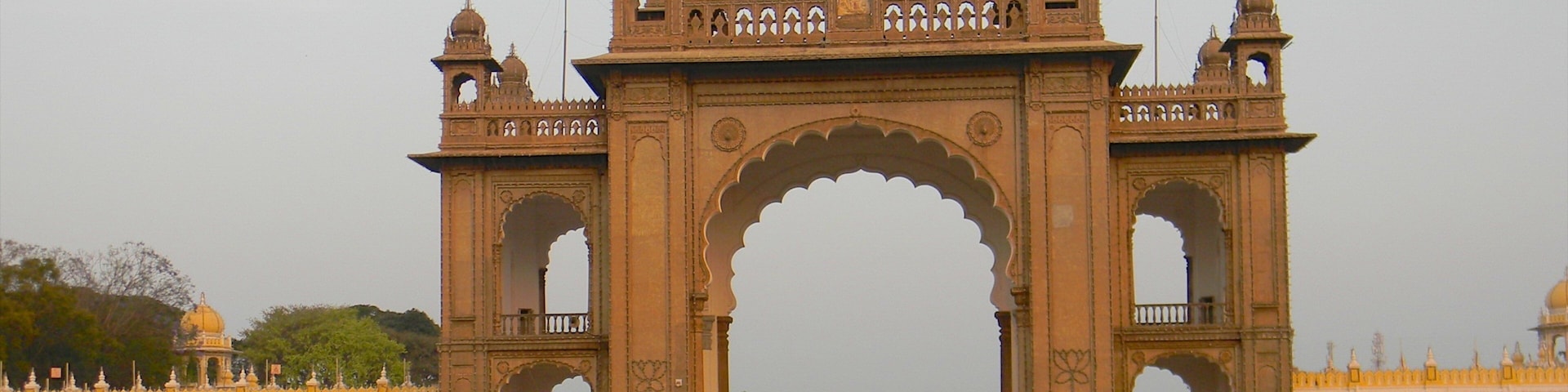 An ornate archway with domed towers and intricate carvings.