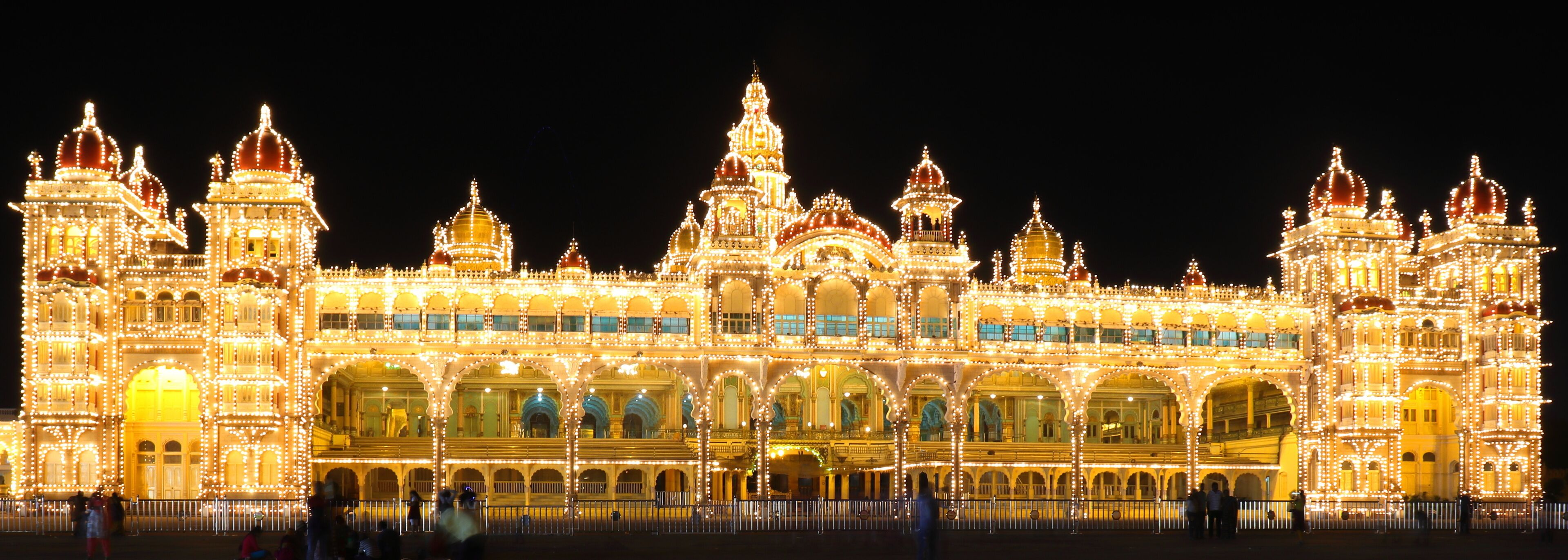 Beautiful Mysore palace brightly lit at night