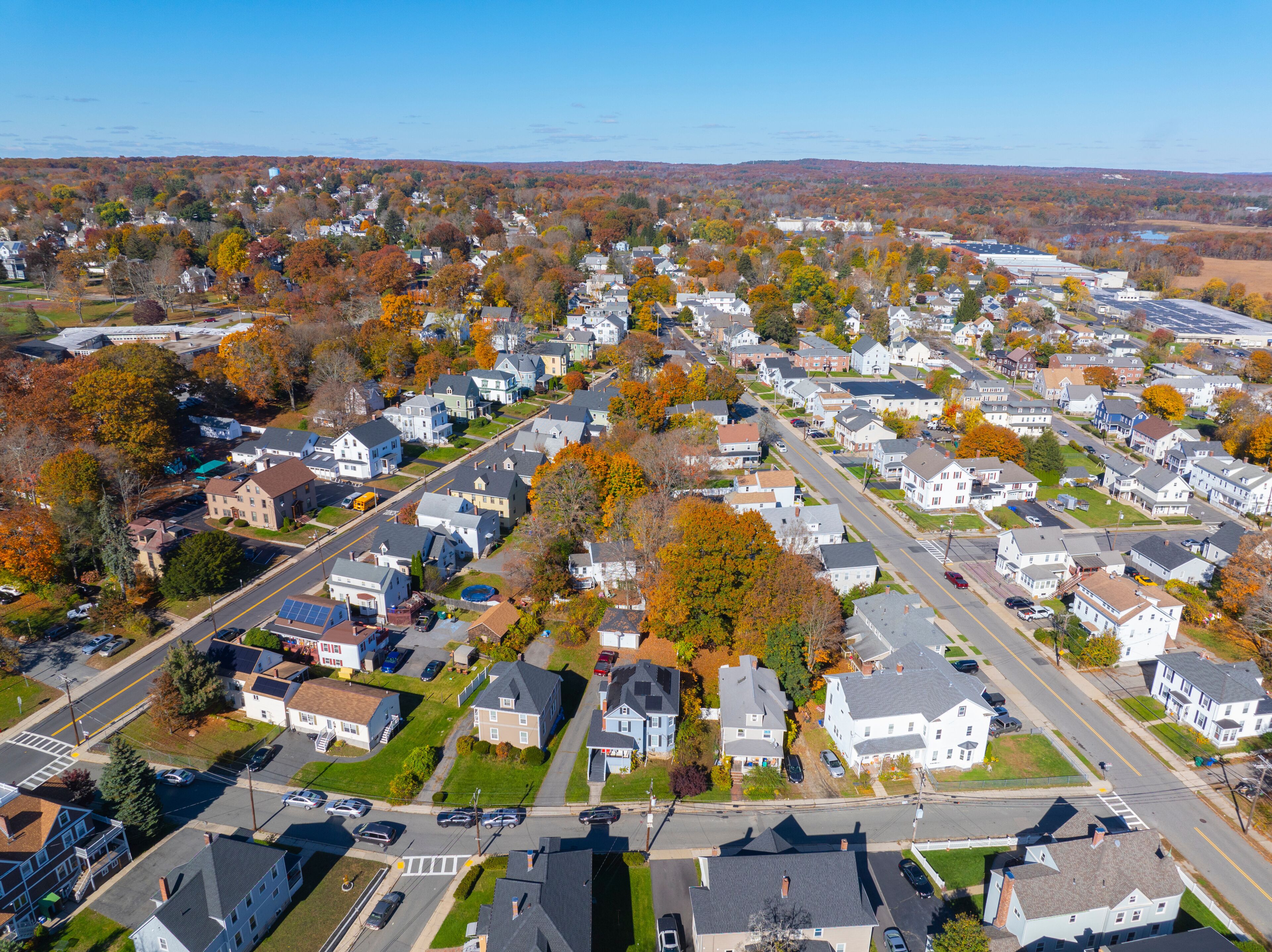 Historic residential houses in fall in historic town center of Milford, Massachusetts MA, USA. 