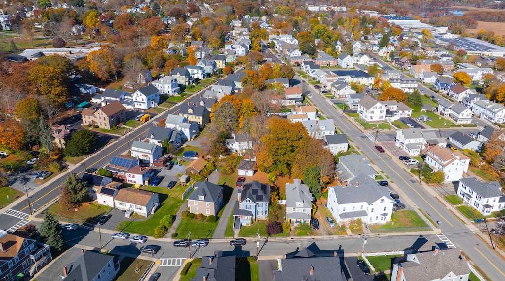 Historic residential houses in fall in historic town center of Milford, Massachusetts MA, USA.
